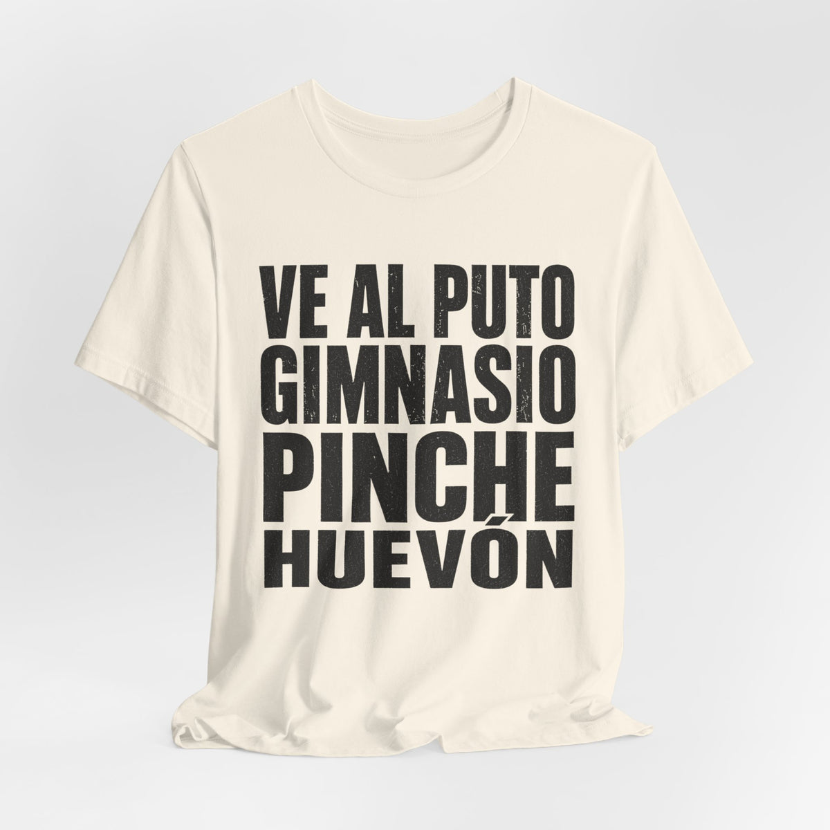 Graphic Tee — "Ve al puto gimnasio, pinche huevón" Spanish Gym Humor T-Shirt