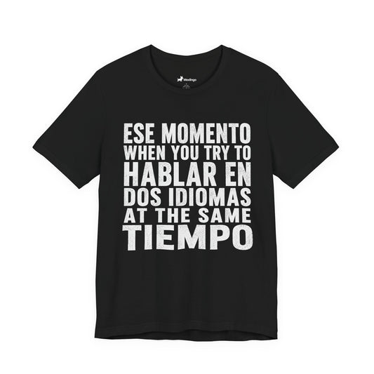 Bilingual Humor Tee – "Dos Idiomas at the Same Tiempo" (White Font)
