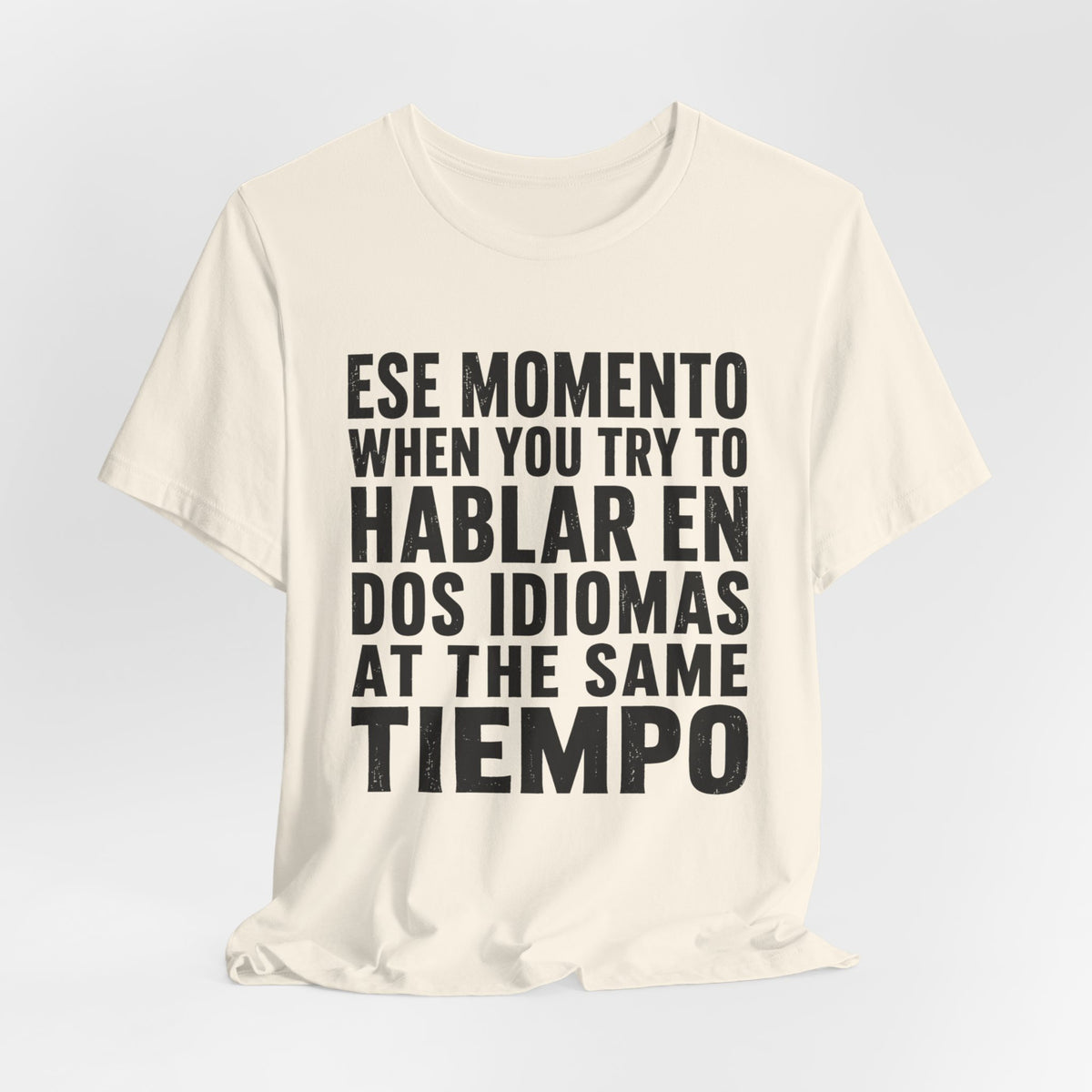 Bilingual Humor Tee – "Dos Idiomas at the Same Tiempo" (Black Font)