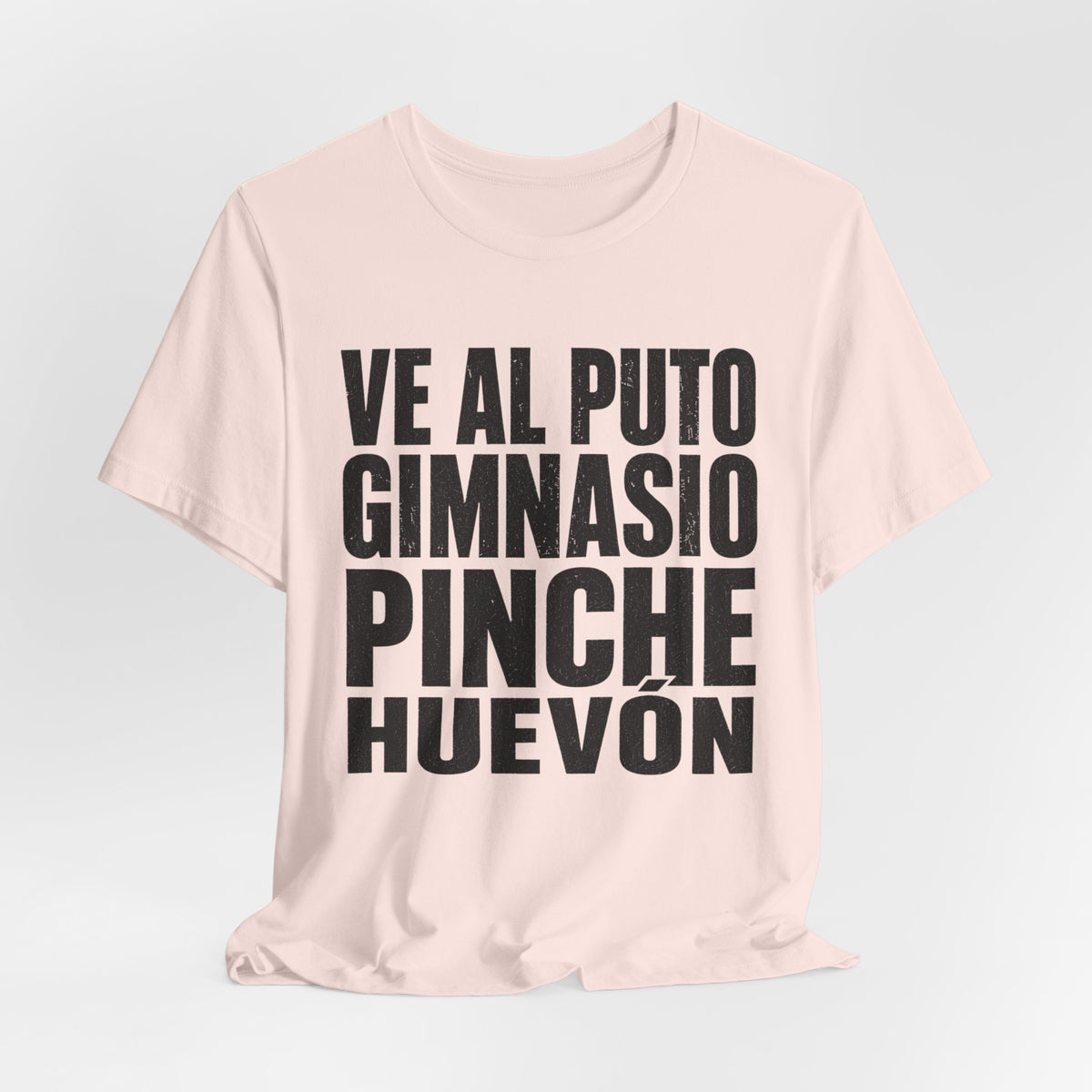 Graphic Tee — "Ve al puto gimnasio, pinche huevón" Spanish Gym Humor T-Shirt