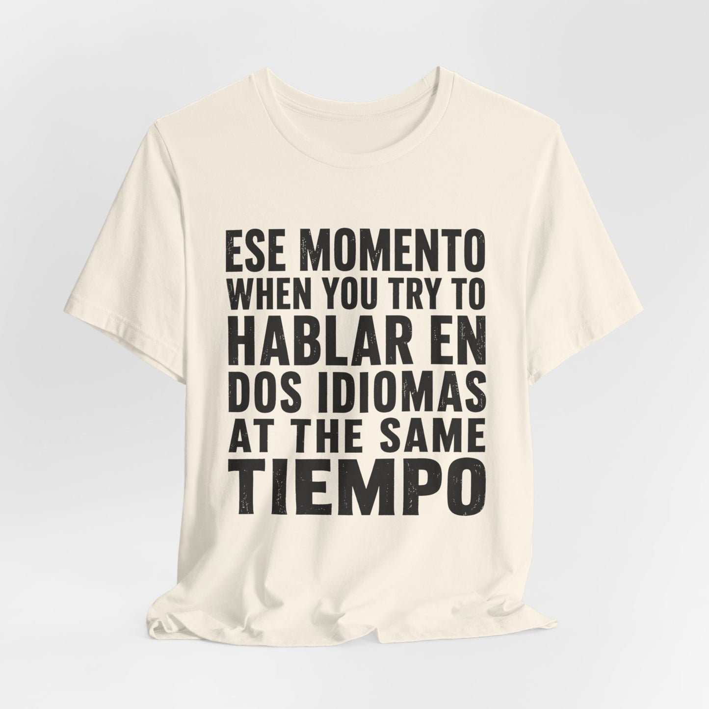 Bilingual Humor Tee – "Dos Idiomas at the Same Tiempo" (Black Font)